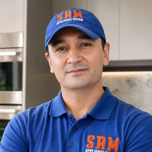 Sam, owner and lead technician of Sam Appliance Repair, in a Sam Appliance Repair branded shirt and cap